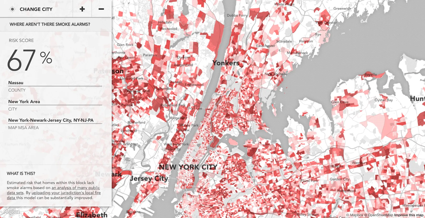 An image of a map of the New York Tri-State area reflecting counties that are more and less likely to have smoke alarms in homes. The counties range from white in color to dark red which signifies a county is highly unlikely to have smoke alarms within the homes in that county. There is a translucent grey panel on the left side of the map that demonstrates an option to change the city, shows the risk score, county name, and location of the area featured in the map.